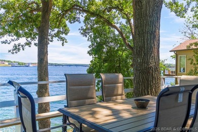 Enjoy unbeatable lake views from this beautifully updated - photo 7