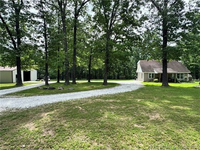 Enjoy peaceful country living on this beautiful 6+ acre property - photo 4