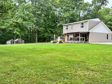 Enjoy peaceful country living on this beautiful 6+ acre property - photo 5