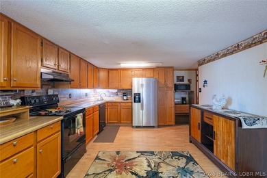 Lakefront home with Endless Potential! This 3-bedroom, 2-bath - photo 11