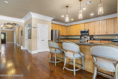 Tucked away on a peaceful waterfront canal in the desirable - photo 12