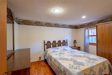 Lakefront home with Endless Potential! This 3-bedroom, 2-bath - photo 13