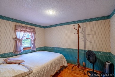 Lakefront home with Endless Potential! This 3-bedroom, 2-bath - photo 14