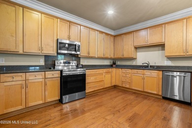 Tucked away on a peaceful waterfront canal in the desirable - photo 14
