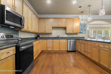 Tucked away on a peaceful waterfront canal in the desirable - photo 15
