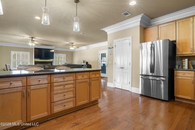 Tucked away on a peaceful waterfront canal in the desirable - photo 16