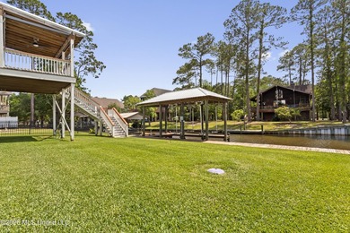 Tucked away on a peaceful waterfront canal in the desirable - photo 41