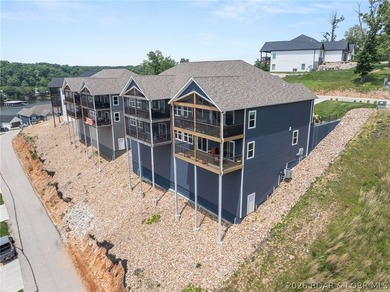 Experience the ultimate lake lifestyle at this stunning - photo 4