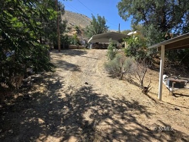 Perched on the high point of the parcel, this manufactured home - photo 17