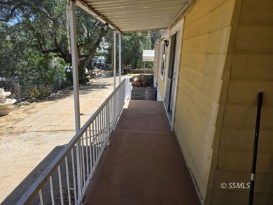 Perched on the high point of the parcel, this manufactured home - photo 24