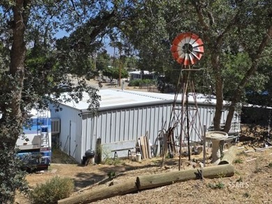 Perched on the high point of the parcel, this manufactured home - photo 27