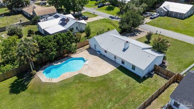 Pool home on nearly half an acre with a large backyard storage - photo 1