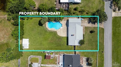 Pool home on nearly half an acre with a large backyard storage - photo 3