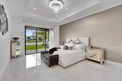 Welcome to this stunning two-story residence in Lotus, Boca - photo 19