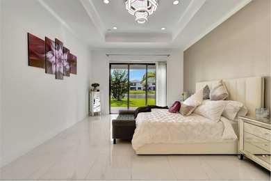 Welcome to this stunning two-story residence in Lotus, Boca - photo 21