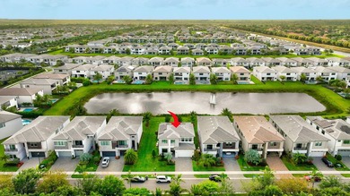 Welcome to this stunning two-story residence in Lotus, Boca - photo 43
