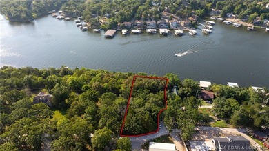 One of a kind property! Boasting 115 feet of Lakefront on the - photo 2