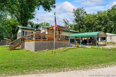 TWO HOMES & A LAKEFRONT LOT - Unique Investment Opportunity at - photo 1