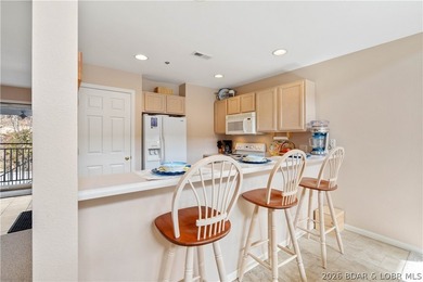 Enjoy peaceful lake living at the 5 MM of the Big Niangua Arm in - photo 7