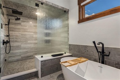 This recently completed and exceptional custom-built home in - photo 19