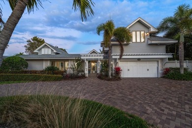 Perfectly poised in the highly sought-after Harbor Bluffs, this - photo 1