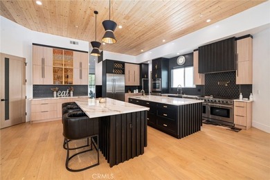 Welcome to a stunning modern estate located on the Island within - photo 12