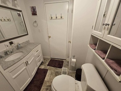 2-bedroom 2-bath home is located on a corner lot. Hardwood - photo 14
