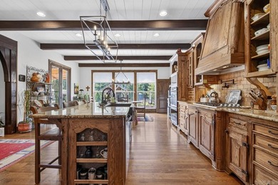 Nestled on nearly two private acres this one-of-a-kind estate - photo 16