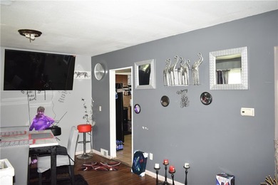 This spacious 4-bedroom home. Large front porch. You also have a - photo 9