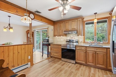 Feel the warmth of this home the moment you walk through the - photo 10