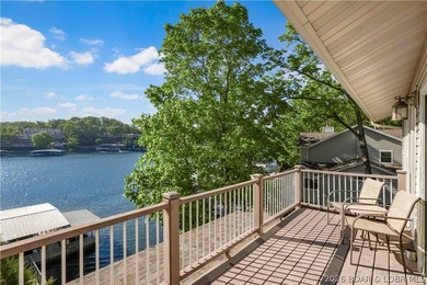 This 3-bedroom, 2-bath home on Nonsuch in Lake Ozark is now - photo 12