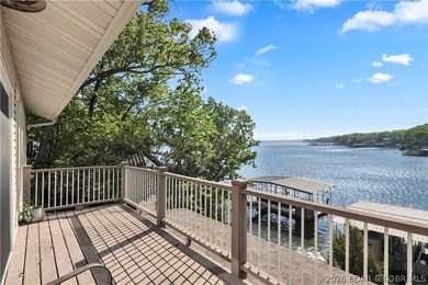 This 3-bedroom, 2-bath home on Nonsuch in Lake Ozark is now - photo 13