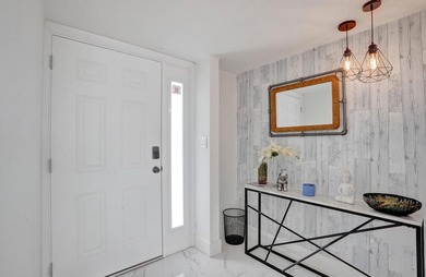 Completely renovated and move-in ready! This stunning unit has - photo 13
