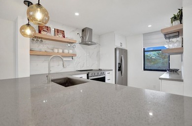 Completely renovated and move-in ready! This stunning unit has - photo 15