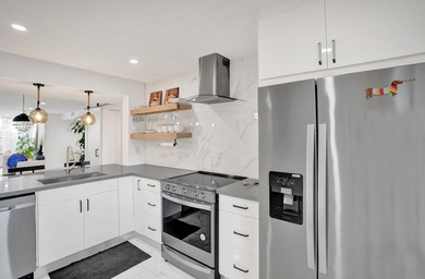 Completely renovated and move-in ready! This stunning unit has - photo 21