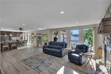 This 3-bedroom, 2-bath home on Nonsuch in Lake Ozark is now - photo 22