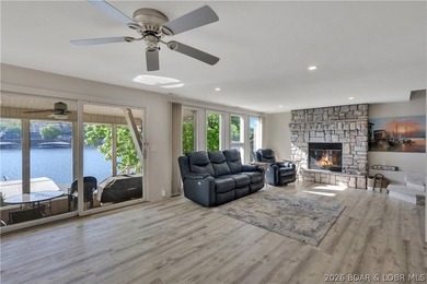 This 3-bedroom, 2-bath home on Nonsuch in Lake Ozark is now - photo 23
