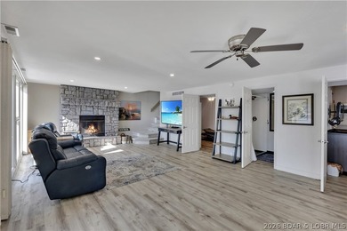 This 3-bedroom, 2-bath home on Nonsuch in Lake Ozark is now - photo 24