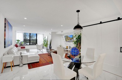 Completely renovated and move-in ready! This stunning unit has - photo 29