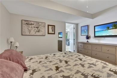 This 3-bedroom, 2-bath home on Nonsuch in Lake Ozark is now - photo 37