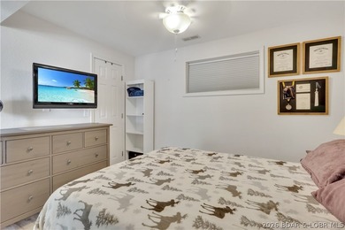 This 3-bedroom, 2-bath home on Nonsuch in Lake Ozark is now - photo 38