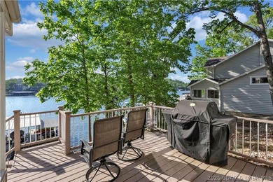This 3-bedroom, 2-bath home on Nonsuch in Lake Ozark is now - photo 44