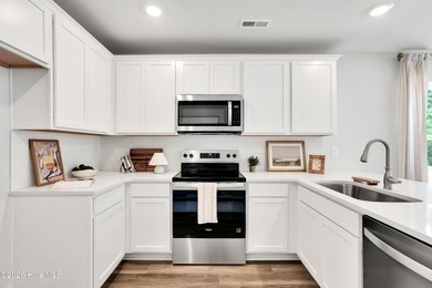The Norman townhome is a two-story residence with 4 bedrooms and - photo 7