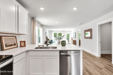 The Norman townhome is a two-story residence with 4 bedrooms and - photo 8