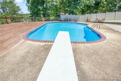 Nestled on over 2 acres with panoramic views of Lake of the - photo 13