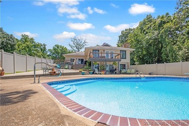 Nestled on over 2 acres with panoramic views of Lake of the - photo 14