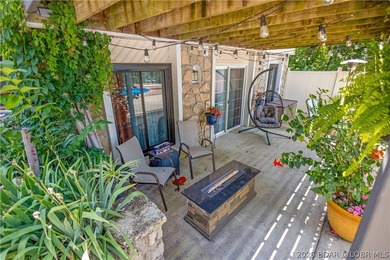 Nestled on over 2 acres with panoramic views of Lake of the - photo 15