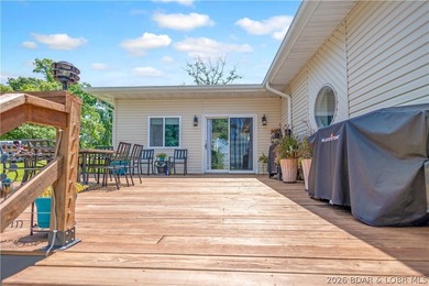 Nestled on over 2 acres with panoramic views of Lake of the - photo 18