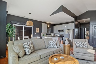 Enjoy this beautifully updated cottage at one of the best golf - photo 3