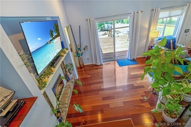 Nestled on over 2 acres with panoramic views of Lake of the - photo 37